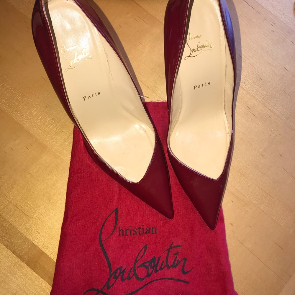 Cherry asymmetrical pumps Christian Louboutin